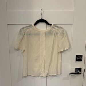 C. Wonder silk Elegant Cream Blouse